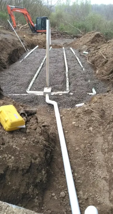 Drainage lines laid in a gravel bed during Landmark Enterprises ditching and drainage work near Dewittville, NY